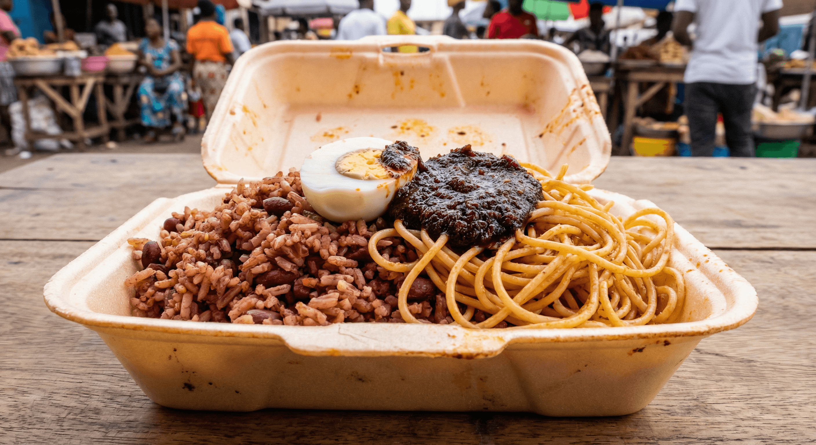Waakye, rice and beans with accompaniments